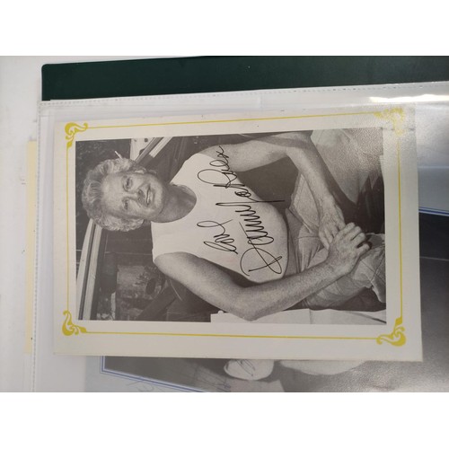 476 - A well filled celebrity autograph album with examples from Chris De Burg, Philip Scofield, Leslie As... 