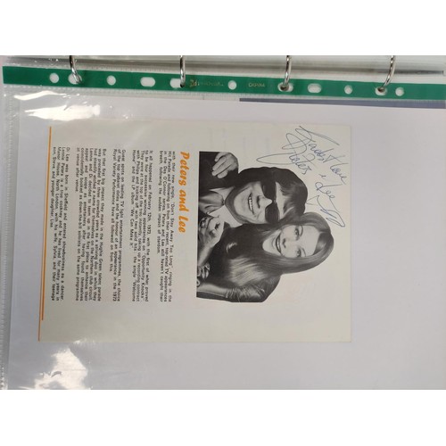 476 - A well filled celebrity autograph album with examples from Chris De Burg, Philip Scofield, Leslie As... 