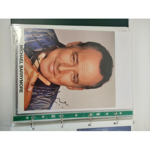 476 - A well filled celebrity autograph album with examples from Chris De Burg, Philip Scofield, Leslie As... 