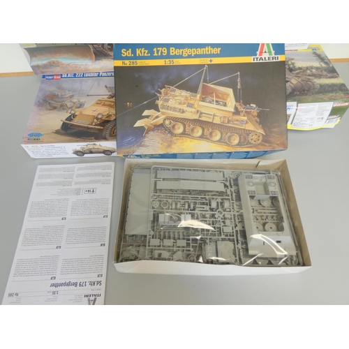 113 - Five 1:35 scale boxed model construction kits to include a Trumpeter British Challenger 2 MBT 00345,... 