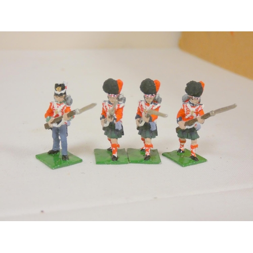 144 - A collection of fine cast miniature lead painted figures relating to the Napoleonic Wars to include ... 