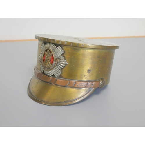 356 - A large First World War trench art Officer's copper and brass cap made from a 1918 4.5