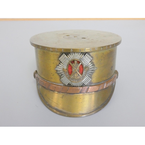 356 - A large First World War trench art Officer's copper and brass cap made from a 1918 4.5