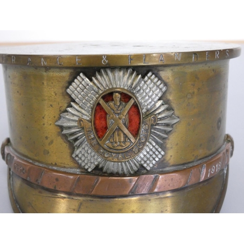 356 - A large First World War trench art Officer's copper and brass cap made from a 1918 4.5