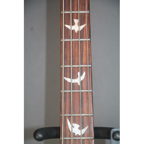 40 - Lindo four string electric bass guitar with dark purple body and bird design finger board, 110cm tal... 