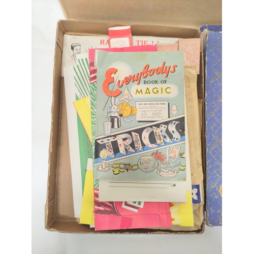 140 - Large box of assorted magic tricks to include Gay Deceiver Magic Box, a partial Ernest Sewell Cabine... 