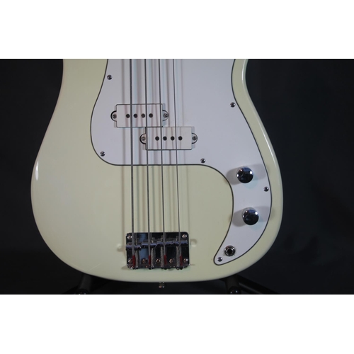 326 - Artisan four string bass guitar with cream and white body in soft case.