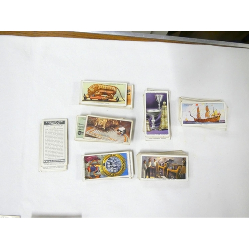 29 - Players cigarette cards including Treasure Trove, Churchman's, National Flags, Sea Fishes,Wills, Chu... 