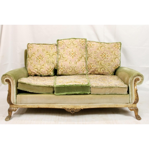 693 - Early 20th century walnut framed suite, the upholstered cushions and stuffed seats on an acanthus sc... 