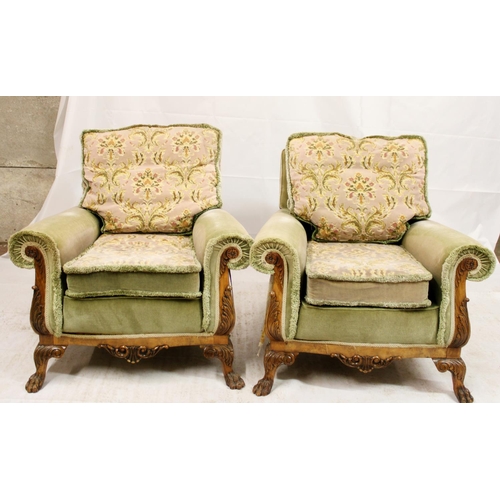 693 - Early 20th century walnut framed suite, the upholstered cushions and stuffed seats on an acanthus sc... 