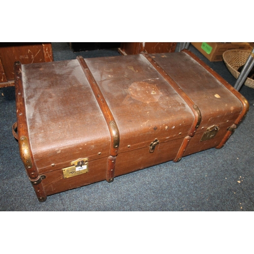 689 - Vintage leather travel trunk.