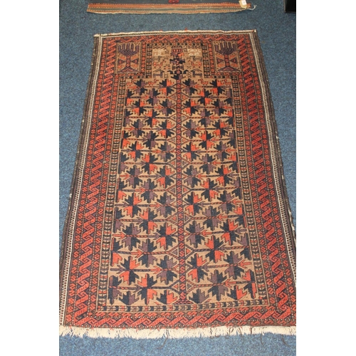 703 - Baluch Persian/Afghan rug, the geometric stylised Tree of Life central pattern within multiple borde... 