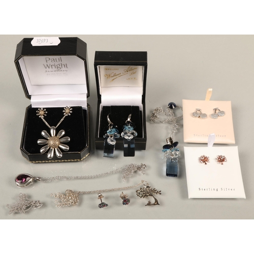 72 - Assortment of silver jewellery including blue gem cluster necklace and earring set, daisy earring an... 