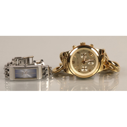 81 - Michael Kors chunky golden chain Runway Twist wristwatch, and a DKNY wristwatch