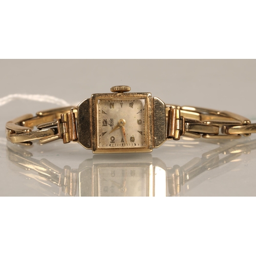 134 - Avia vintage 9ct gold wristwatch with a rolled gold strap