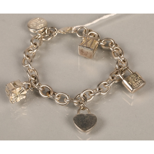 140 - Silver charm bracelet 