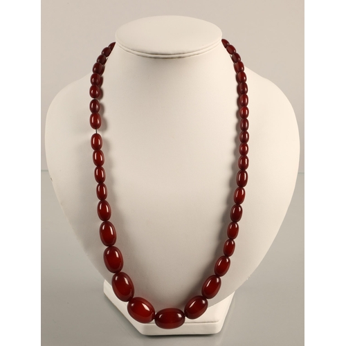 83 - Cherry amber / bakelite beaded necklace, 54g gross weight