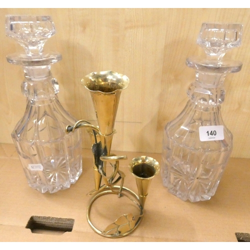 140 - Pair of cut glass decanters and table epergne.