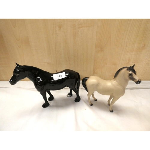 145 - Beswick black horse and Palamino horse figure.