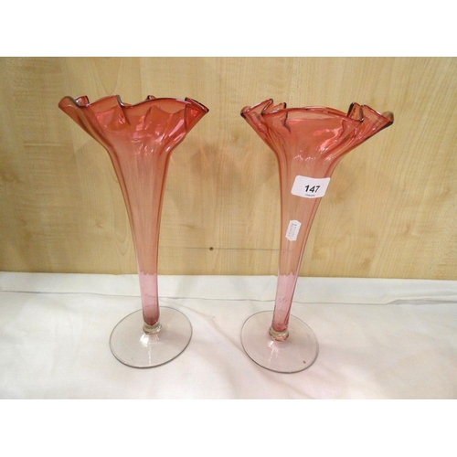 147 - Pair of cranberry glass vases.