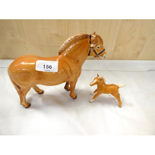 156 - Two Beswick Palomino ponies.