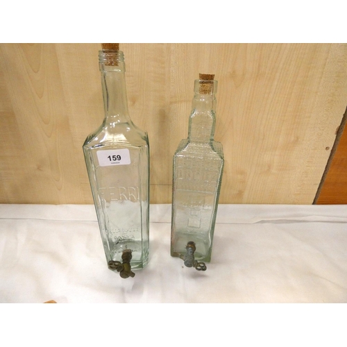 159 - Two vintage wine bottles with taps.