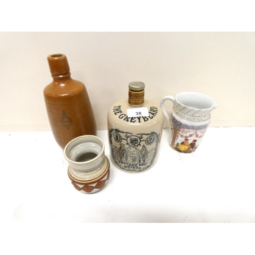 38 - Two stoneware studio pottery bottles, a Victorian jug and an Art Pottery vase. (4)