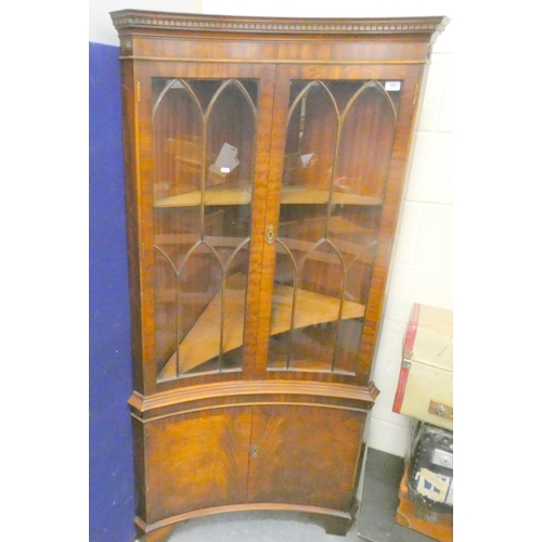 582 - Modern curved mahogany corner cupboard.