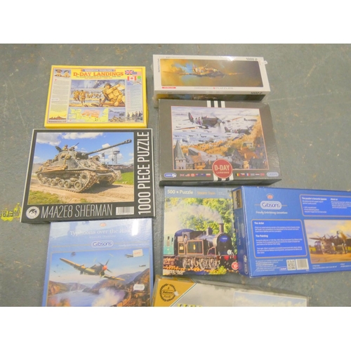 71 - Various new and used, military related jigsaws.