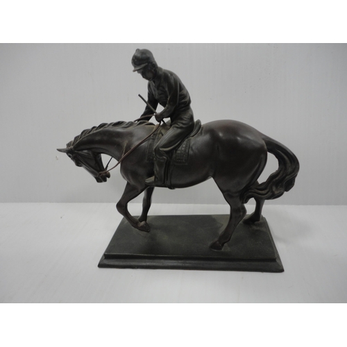 102 - Two contemporary figure groups modelled as a jockey and rider, one example by Heredities. 