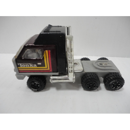 108 - Carton containing playworn diecast models to include Corgi, Tonka and Dinky examples.