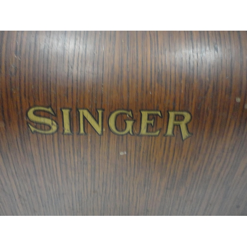 110 - Singer portable sewing machine in fitted case.