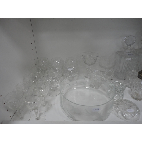 123 - Glassware to include a faceted crystal serving tray, two decanters, brandy glasses, Babycham glasses... 