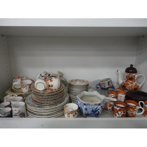 135 - Miscellaneous tea and coffee wares, bisque figures etc (one shelf).