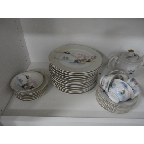 136 - Assorted teawares, part Japanese dinner set, posy ornaments etc (four shelves).