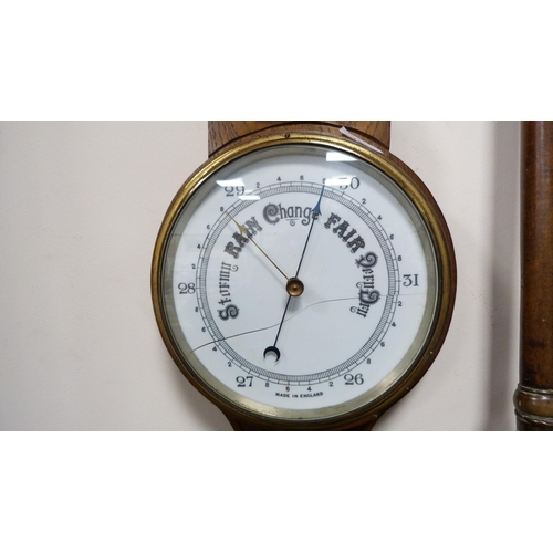 166 - Banjo wall barometer and a copper bed warming pan.  (2)