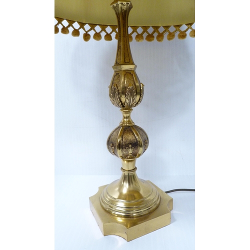 169 - Large modern brass-effect table lamp and shade, and another.  (2)