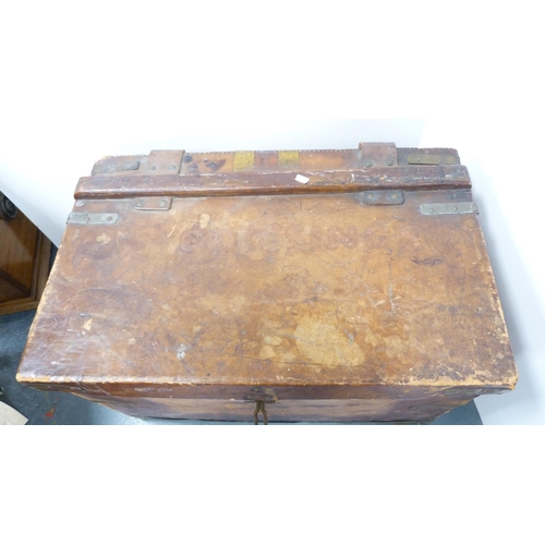 185 - Hide tooled travel trunk containing a quantity of loose and framed oils by amateur artists to includ... 