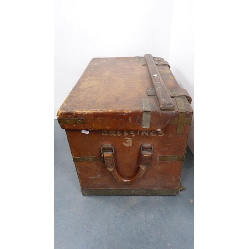 185 - Hide tooled travel trunk containing a quantity of loose and framed oils by amateur artists to includ... 