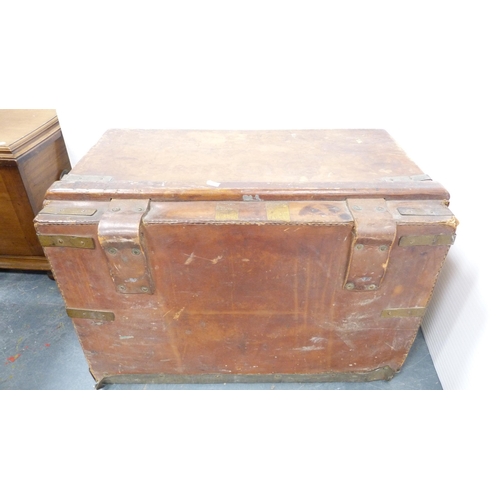 185 - Hide tooled travel trunk containing a quantity of loose and framed oils by amateur artists to includ... 