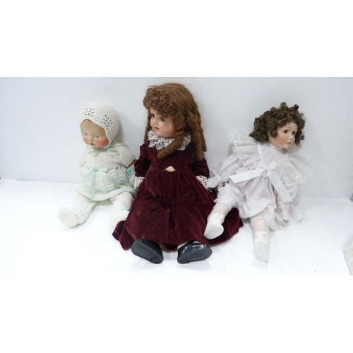 188 - Porcelain-head doll, two other boxed Heirloom dolls and an Imperial typewriter.