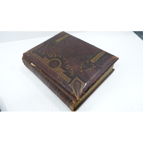 193 - Two Edwardian tooled photograph albums and contents.