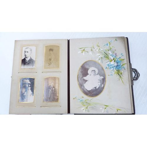 193 - Two Edwardian tooled photograph albums and contents.