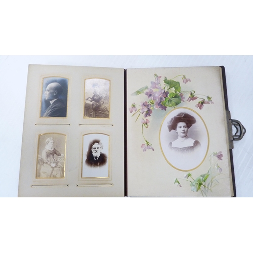 193 - Two Edwardian tooled photograph albums and contents.