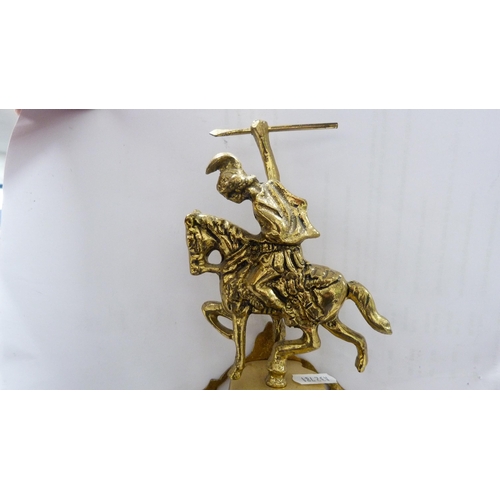 210 - Reproduction gilt metal mantel clock surmounted by a warrior on horseback.