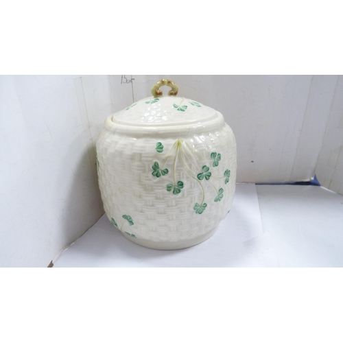 215 - Pair of modern Belleek porcelain cylindrical jars and covers decorated with shamrocks.