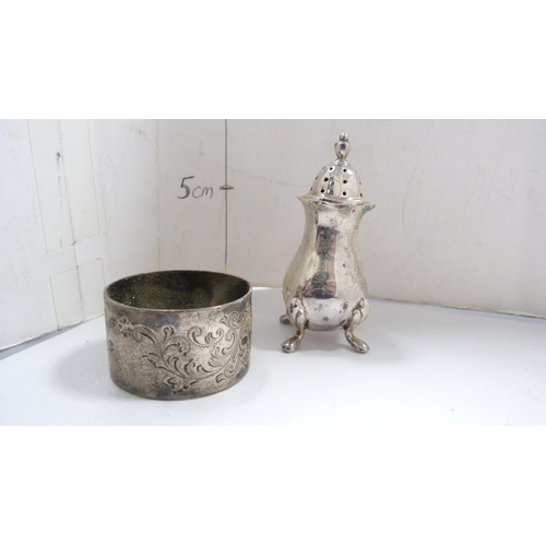 217 - Silver napkin ring, plated condiments and a plated pepper pot.