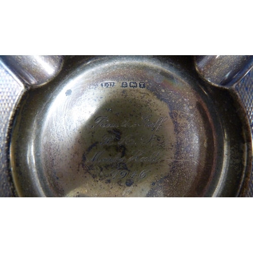 258 - Silver engine turned ashtray, engraved to the well, 43g gross.