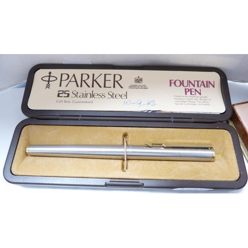 268 - Waterman fountain pen, boxed Parker stainless steel fountain pen and two other pens.