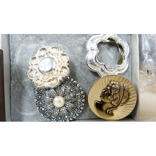 277 - Cameo brooches, silver locket on chain, costume brooches, spray brooches, cluster earrings, Celtic p... 